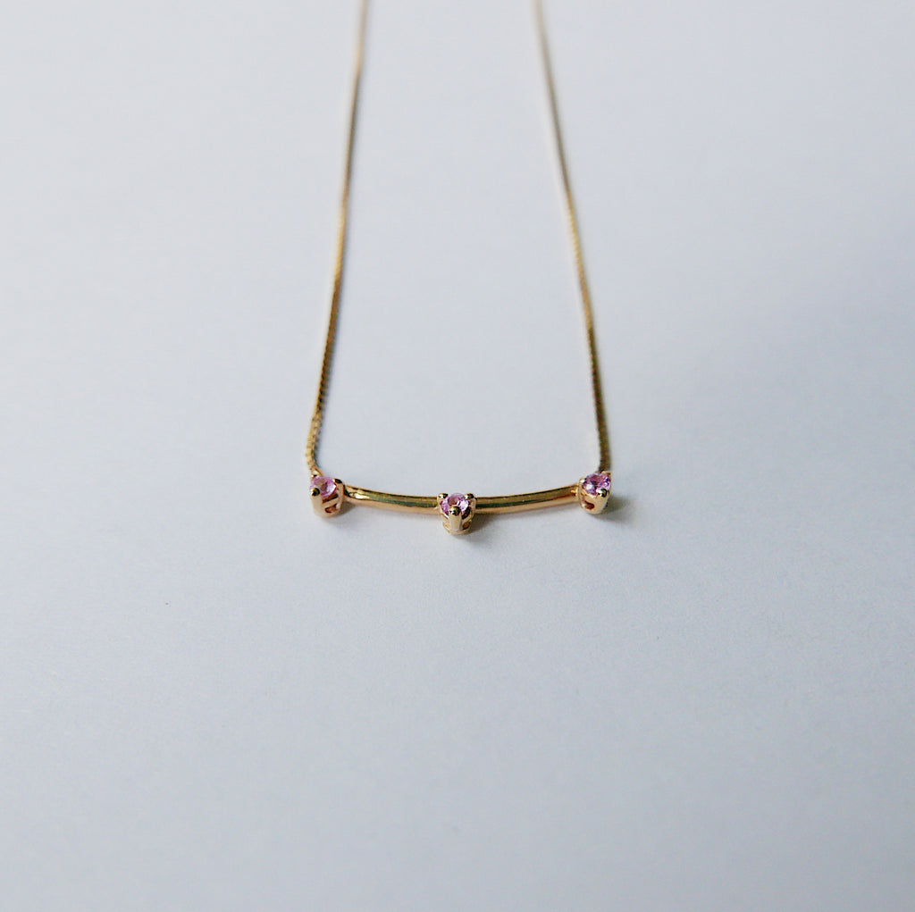 Simple staple everyday necklace with a pop of color.  Normally $580  Details: Pink Sapphires measures about 1.7mm Total necklace length is 16.75 inches  14k Yellow Gold  Free Shipping on Domestic Orders over $50  Materials: 14 yellow gold