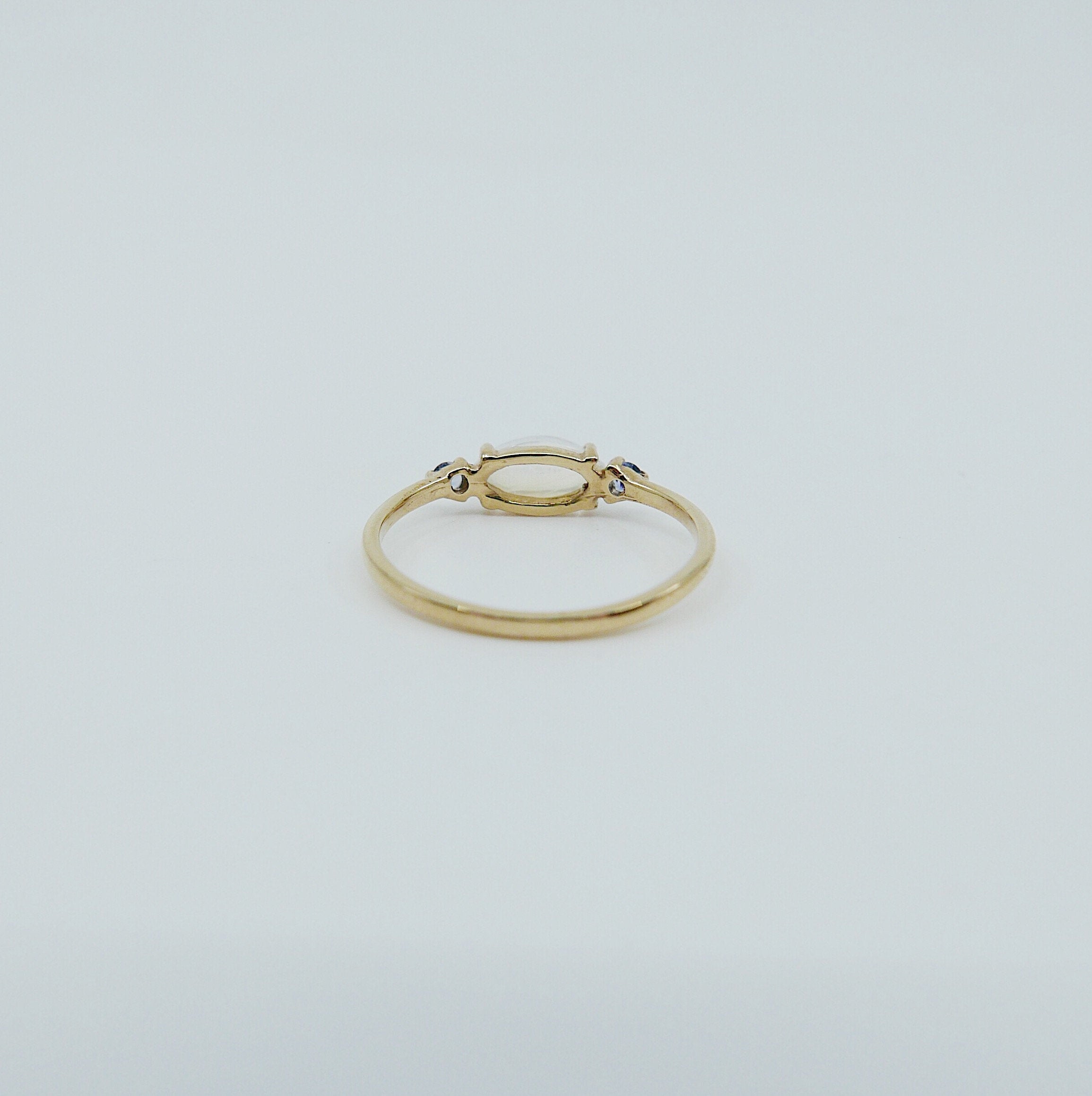 Twiggy Moonstone Ring, sleek marquise moonstone ring, 3 stone ring, marquise moonstone and sapphire ring, 14k gold moonstone ring