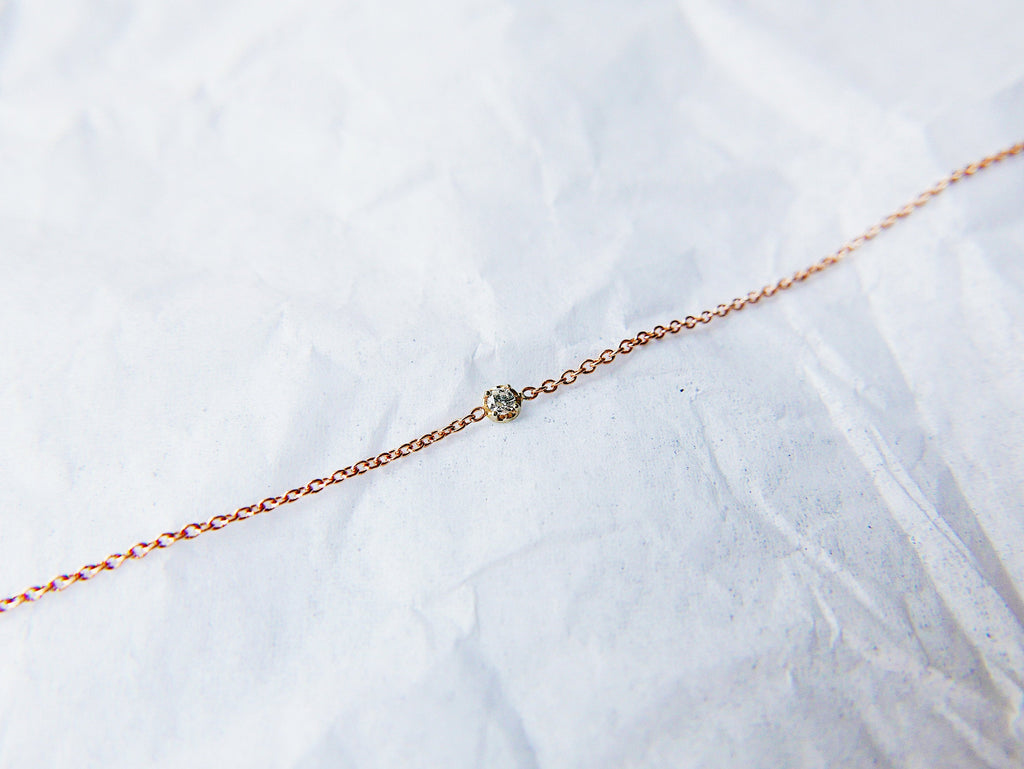 14k single diamond bracelet