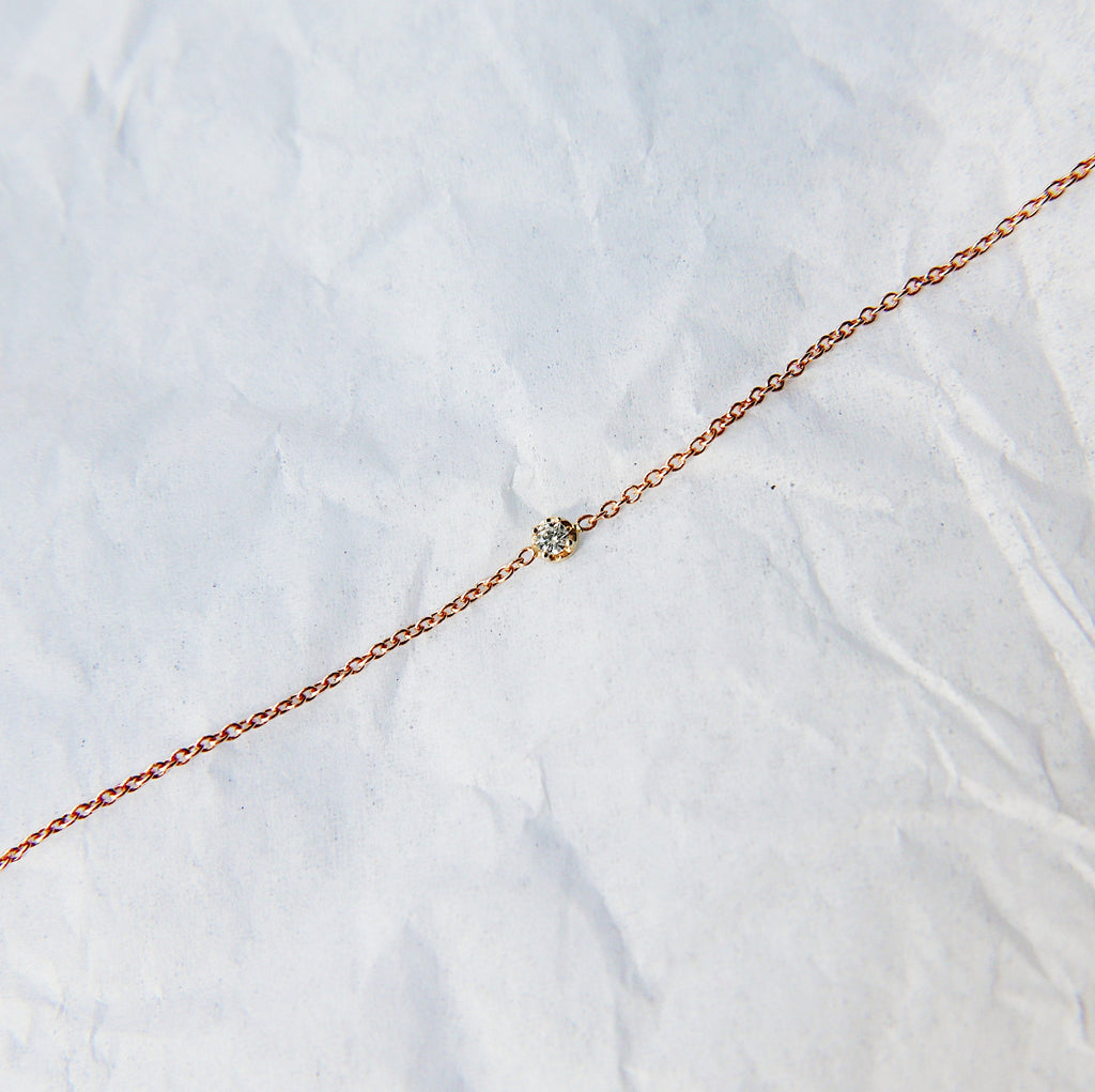 14k single diamond bracelet