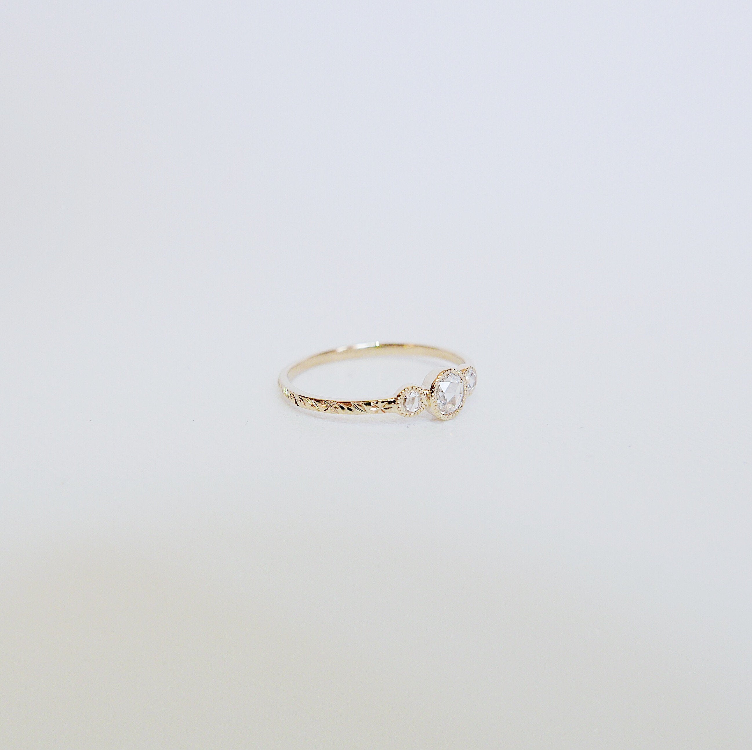 three stone ring  three stone band  three diamond ring  rose cut diamonds  Rings  minimalist  mgj  mason grace jewelry  mason grace  jewelry  hand engraved band  gift  fine jewelry  diamond ring  diamond  delicate gold ring  dainty ring  classic ring  birthstone ring