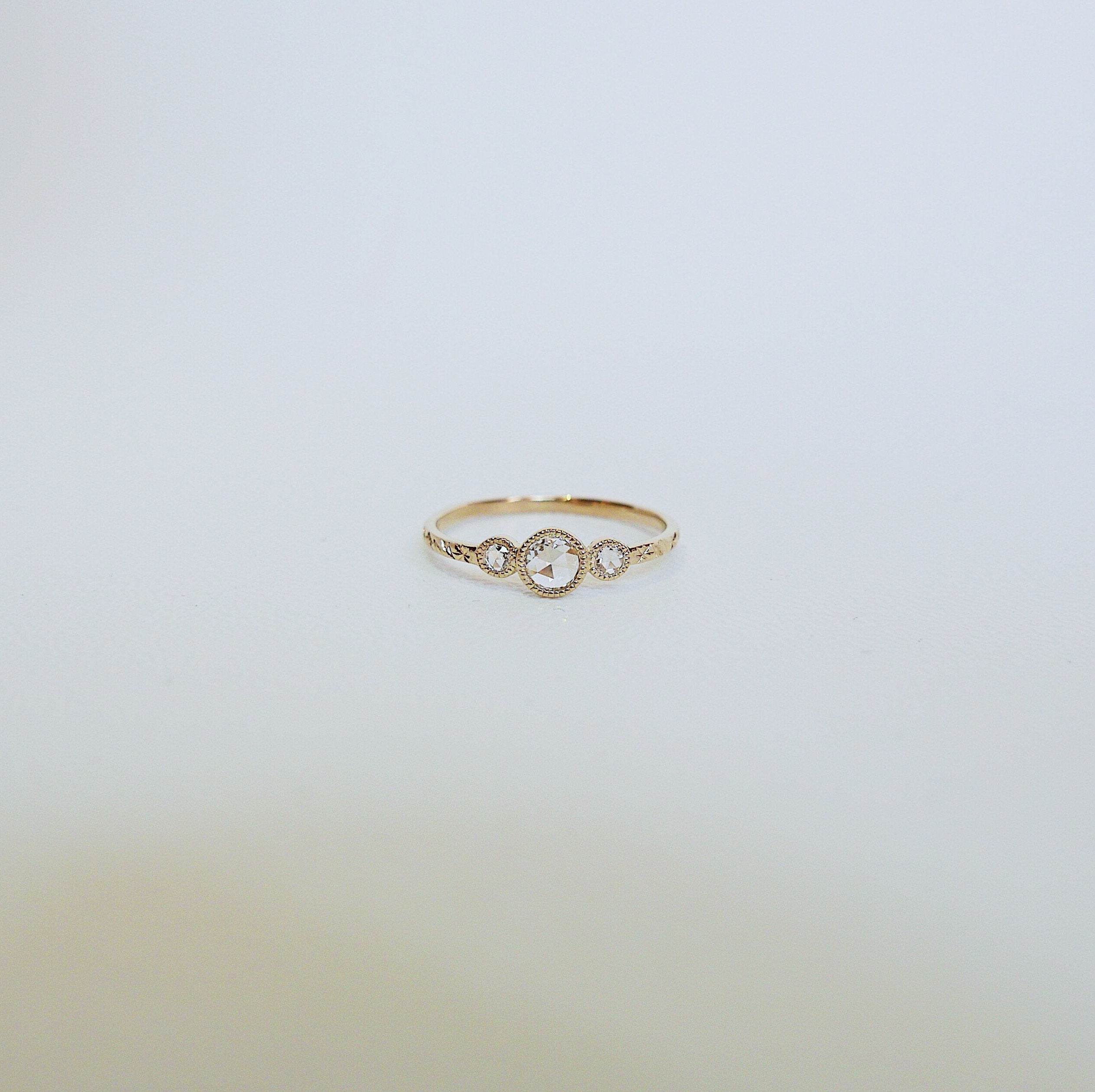 three stone ring  three stone band  three diamond ring  rose cut diamonds  Rings  minimalist  mgj  mason grace jewelry  mason grace  jewelry  hand engraved band  gift  fine jewelry  diamond ring  diamond  delicate gold ring  dainty ring  classic ring  birthstone ring