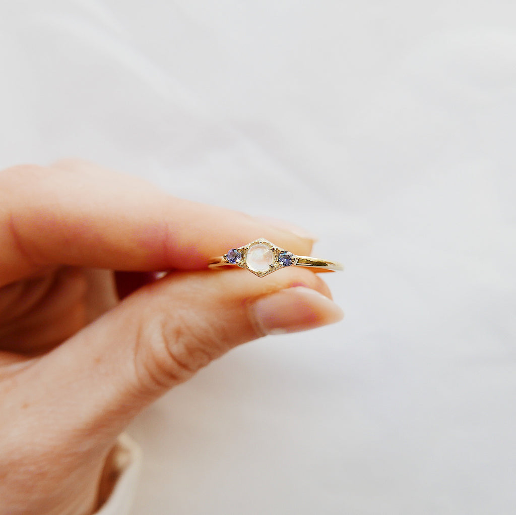 three stone ring  tanzanite ring  stacking ring  Rings  Multi-Stone Rings  moonstone tanzanite  moonstone ring  mgj  mason grace jewelry  mason grace  jewelry  gold moonstone ring  fine jewelry  dainty ring  birthstone ring  art deco tanzanite  art deco style ring  art deco ring  art deco moonstone  14k gold ring