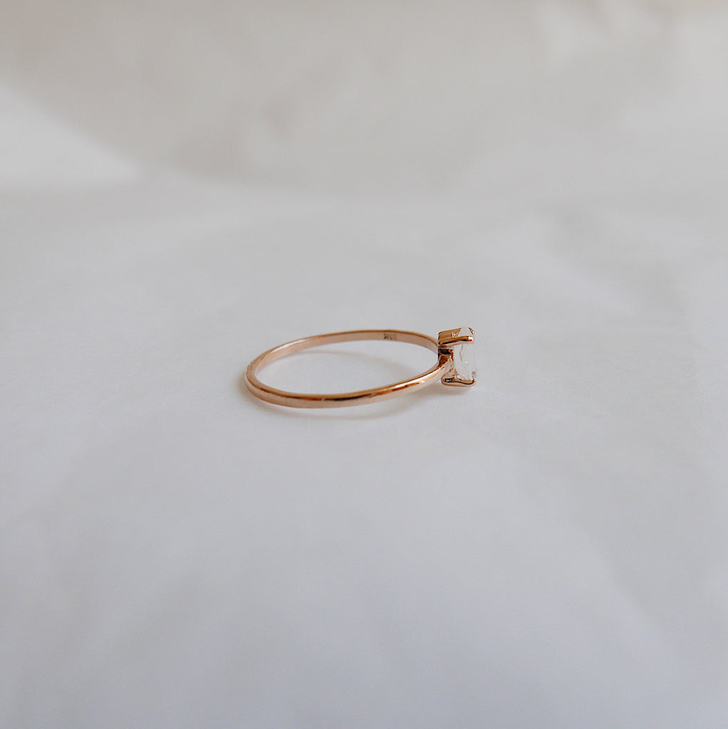 Solitaire Rings  sleek ring  Rings  moonstone ring  moonstone marquise  minimalist  mgj  mason grace jewelry  mason grace  marquise shaped ring  marquise ring  marquise moonstone  marquise cut  jewelry  glowing stone ring  fine jewelry  ethereal ring  dainty ring  blue ring  birthstone ring