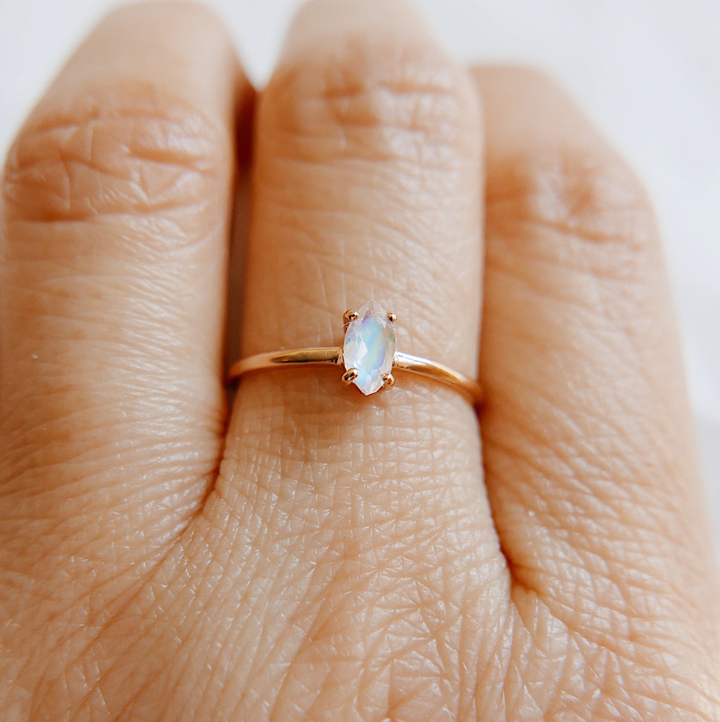 Solitaire Rings  sleek ring  Rings  moonstone ring  moonstone marquise  minimalist  mgj  mason grace jewelry  mason grace  marquise shaped ring  marquise ring  marquise moonstone  marquise cut  jewelry  glowing stone ring  fine jewelry  ethereal ring  dainty ring  blue ring  birthstone ring