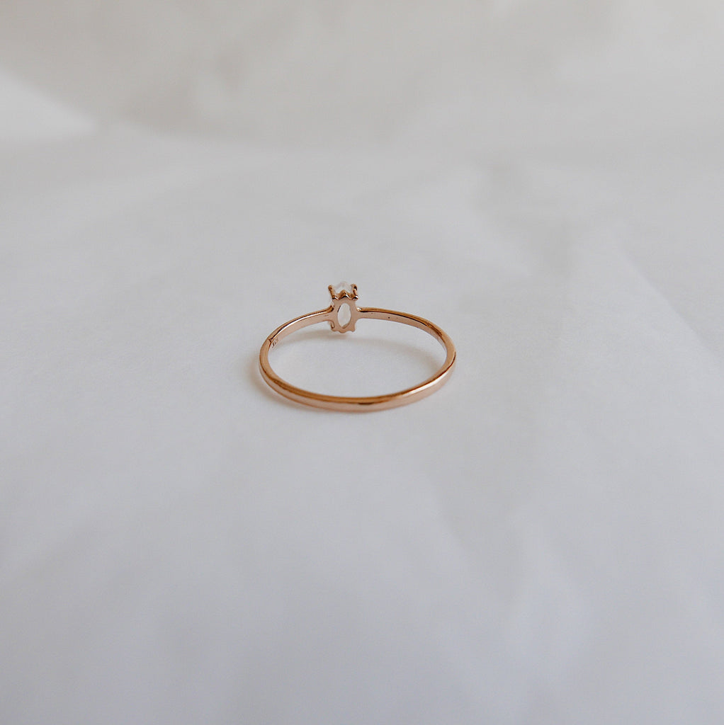 Solitaire Rings  sleek ring  Rings  moonstone ring  moonstone marquise  minimalist  mgj  mason grace jewelry  mason grace  marquise shaped ring  marquise ring  marquise moonstone  marquise cut  jewelry  glowing stone ring  fine jewelry  ethereal ring  dainty ring  blue ring  birthstone ring