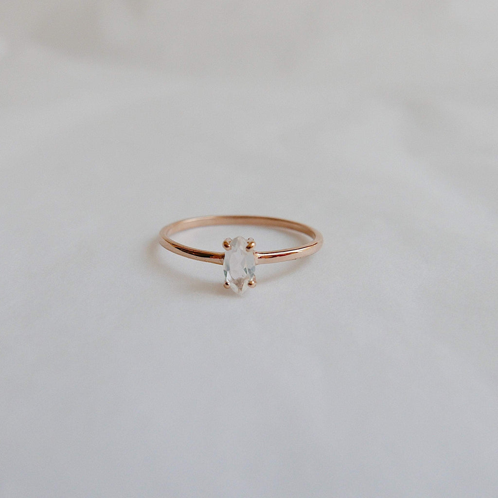 Solitaire Rings  sleek ring  Rings  moonstone ring  moonstone marquise  minimalist  mgj  mason grace jewelry  mason grace  marquise shaped ring  marquise ring  marquise moonstone  marquise cut  jewelry  glowing stone ring  fine jewelry  ethereal ring  dainty ring  blue ring  birthstone ring