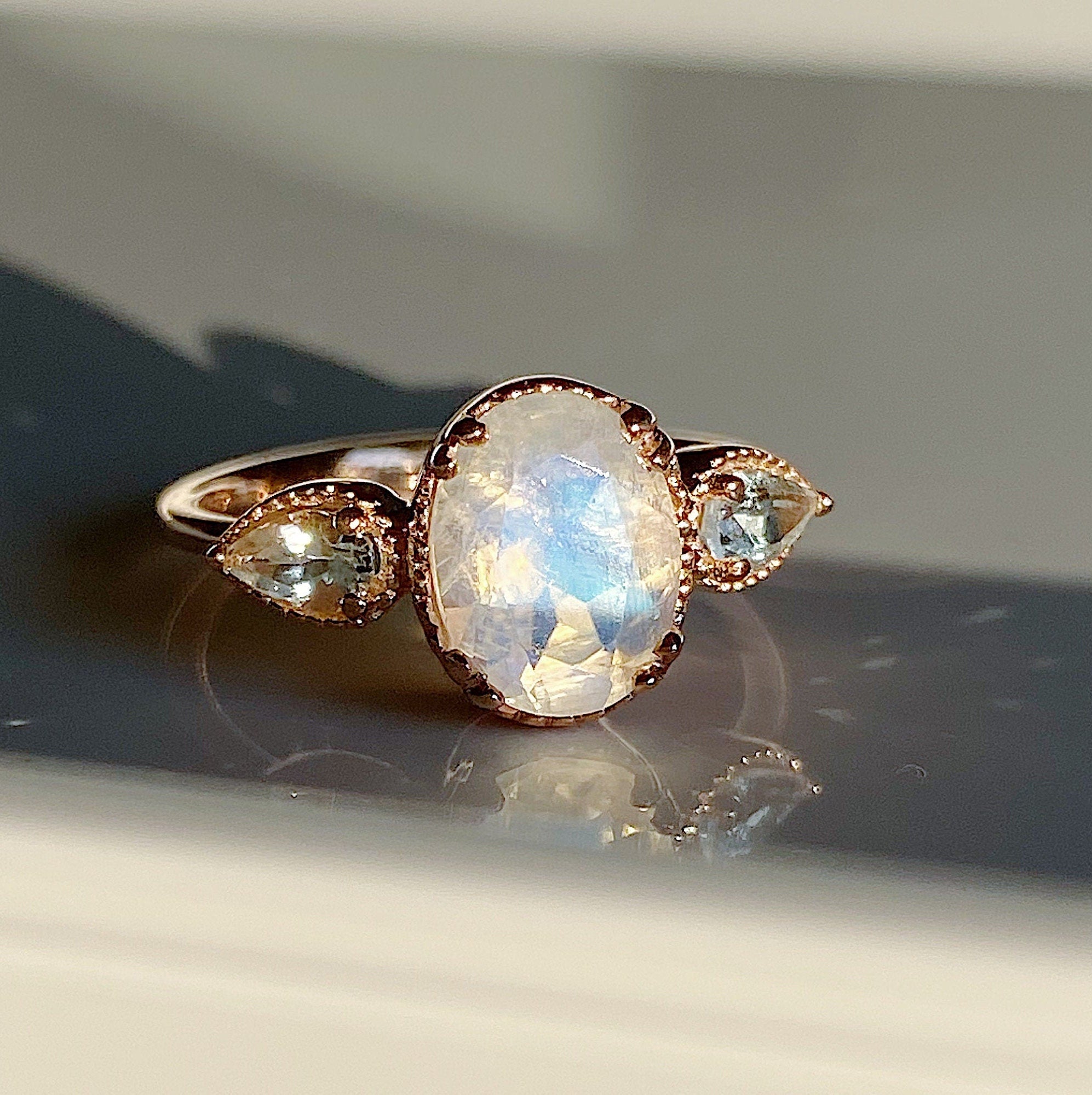New Dawn Moonstone and Aquamarine ring, Oval Moonstone Ring with Pear aquamarine Side Stones, three stone moonstone ring